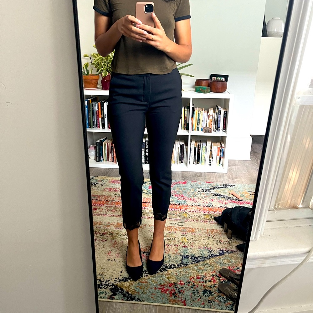 Black Zara dress trousers with tapered legs.